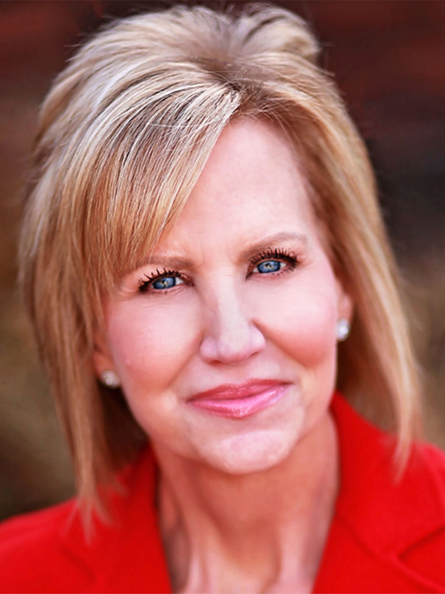 A woman smiling at the camera